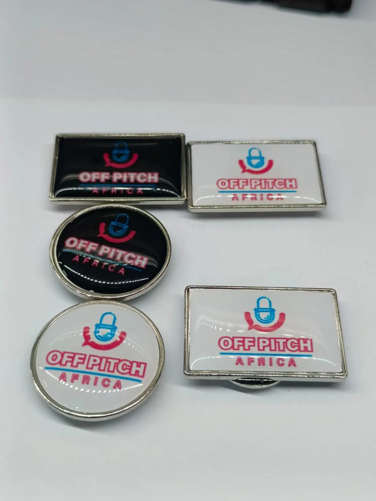 Off Pitch Africa branded merchandise pins